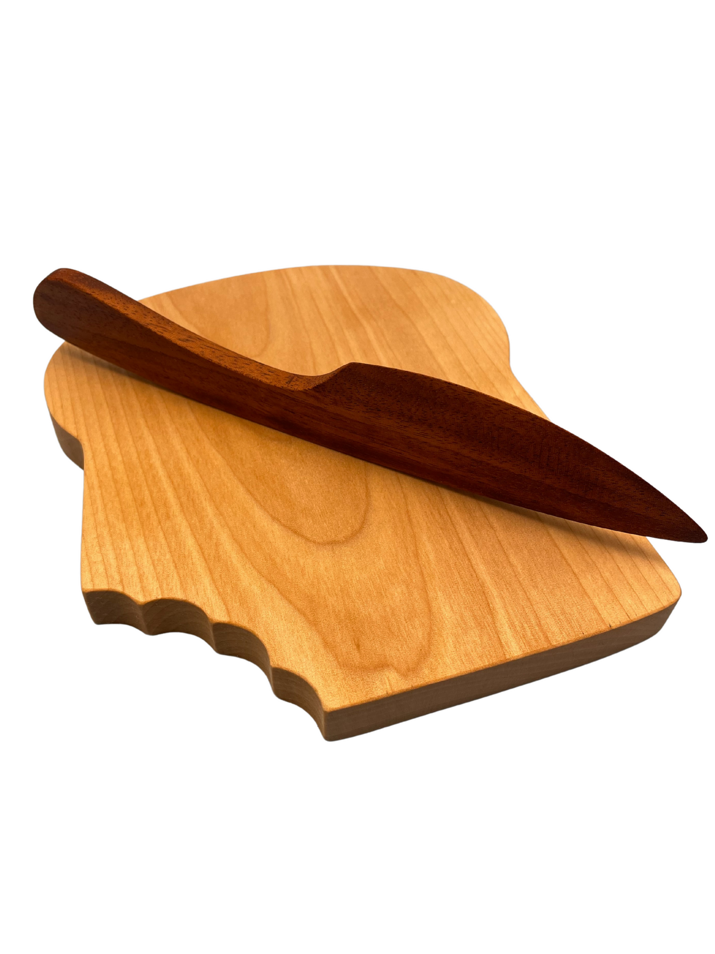 Rebanada de pan y un cuchillo de mantequilla