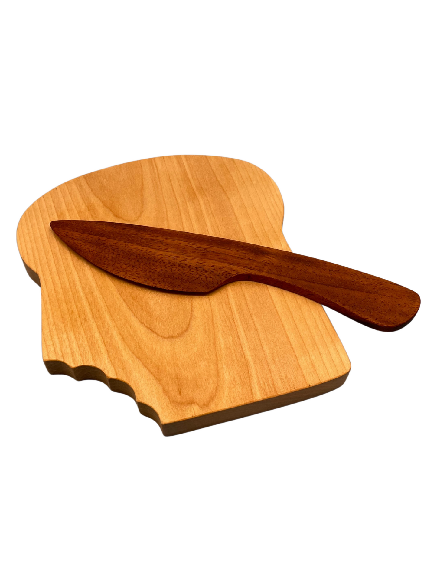 Rebanada de pan y un cuchillo de mantequilla